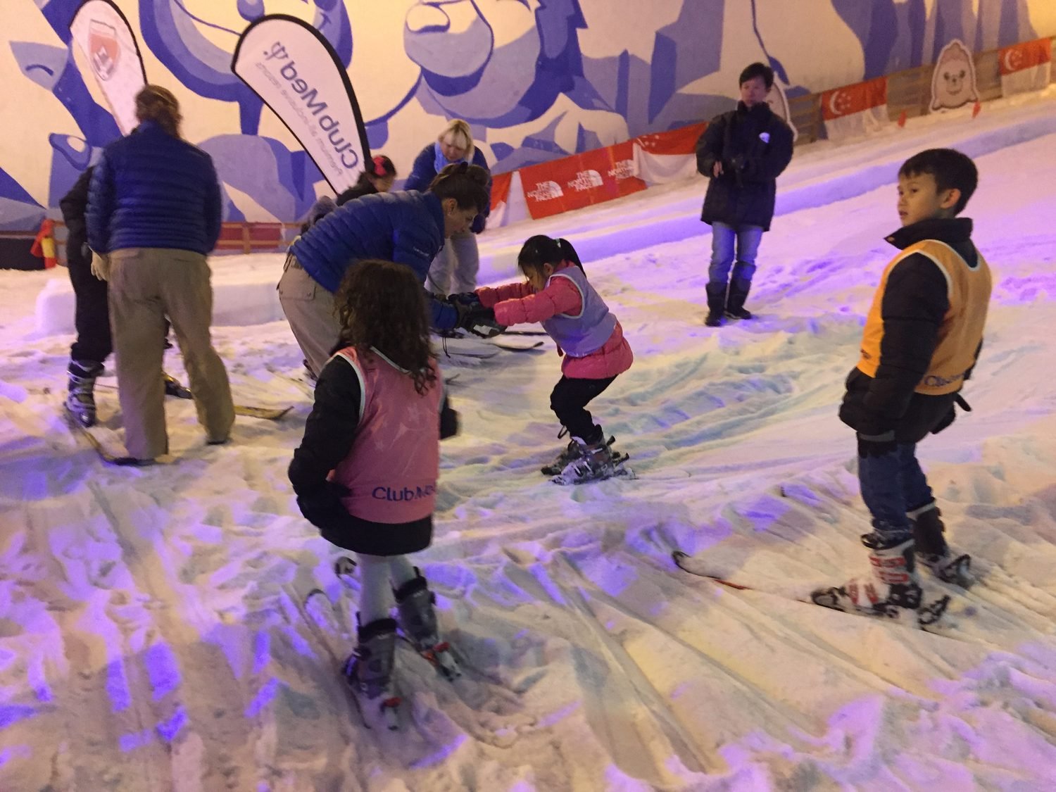 Children learning to ski