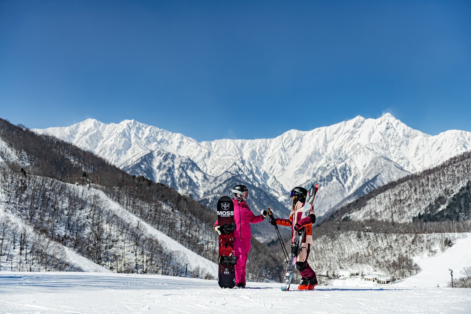 A family enjoying the snow together